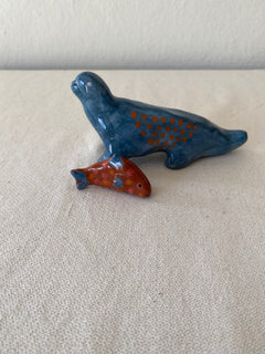 mini ceramic sculpture about 12cm tall
is hand shaping