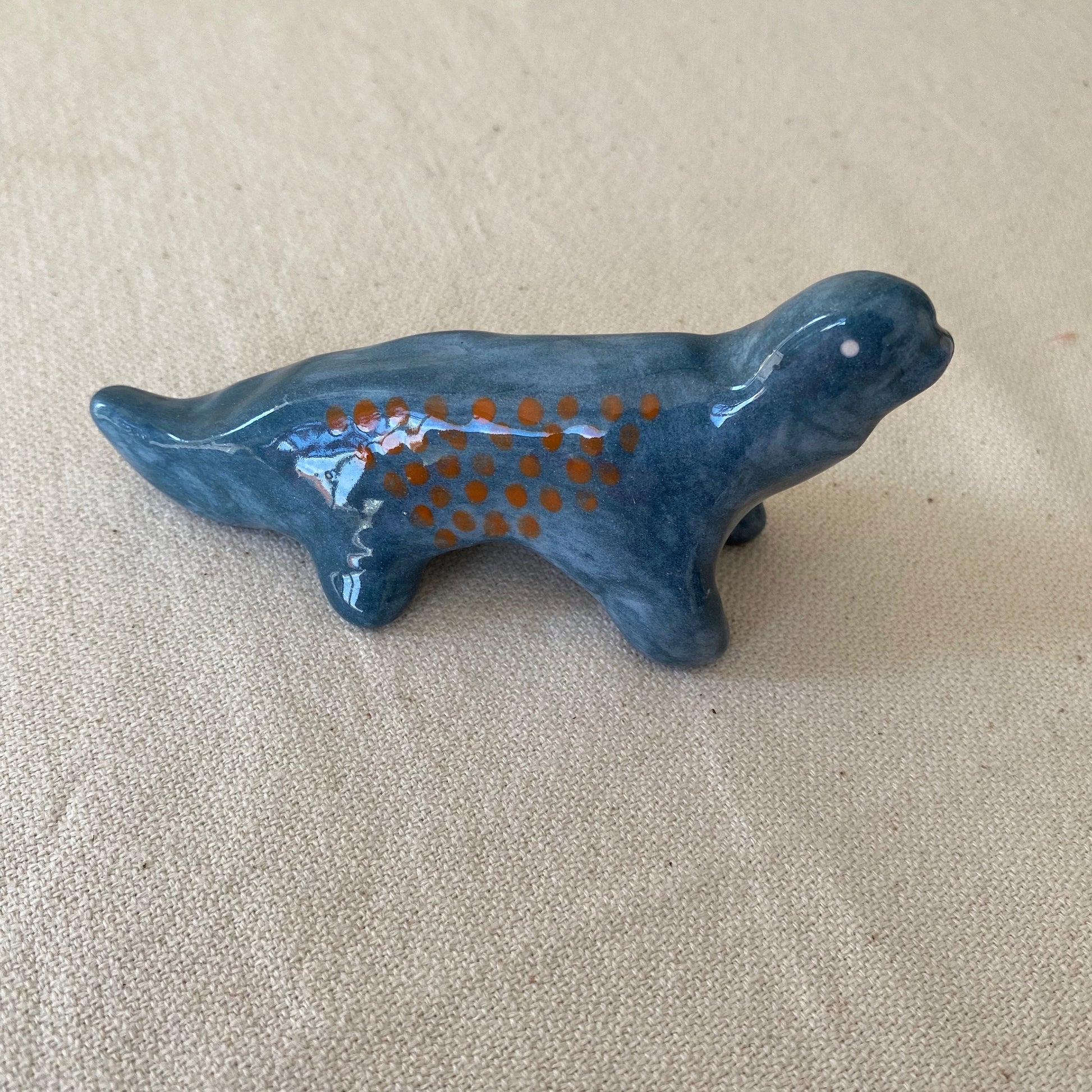 mini ceramic sculpture about 12cm tall
is hand shaping