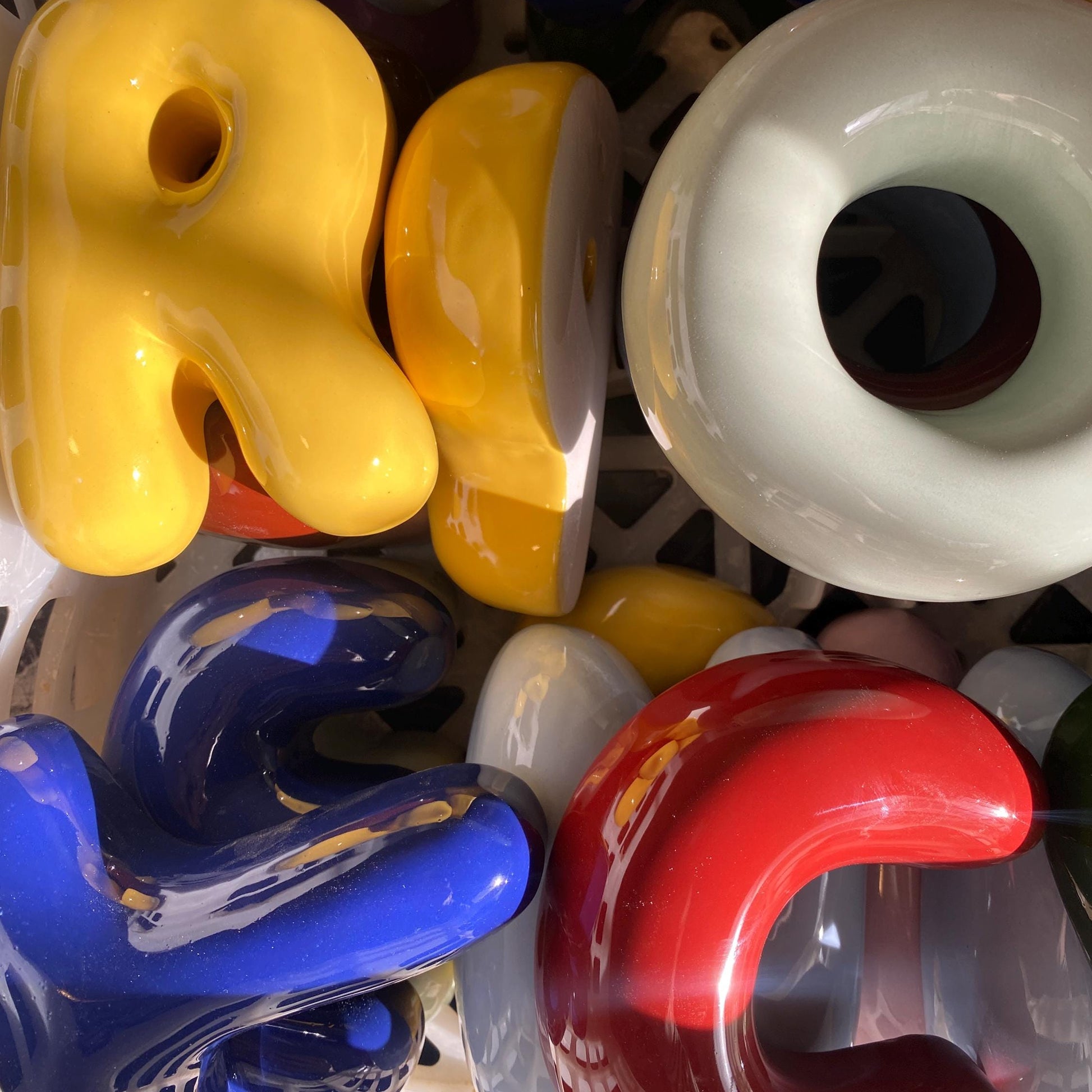 Colorful plastic letters in a box